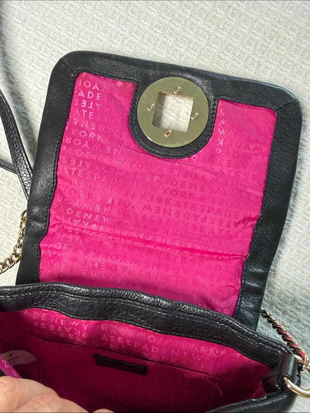 Kate Spade black quilted leather crossbody bag with gold chain and hardware